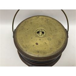  Georgian circular footwarmer with turned wood with decorative ebonised band, brass cover and swing handle, D25cm