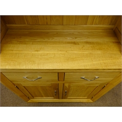  Light oak dresser, two glazed doors enclosing single shelf above two drawers and two cupboard doors, W90cm, H193cm  