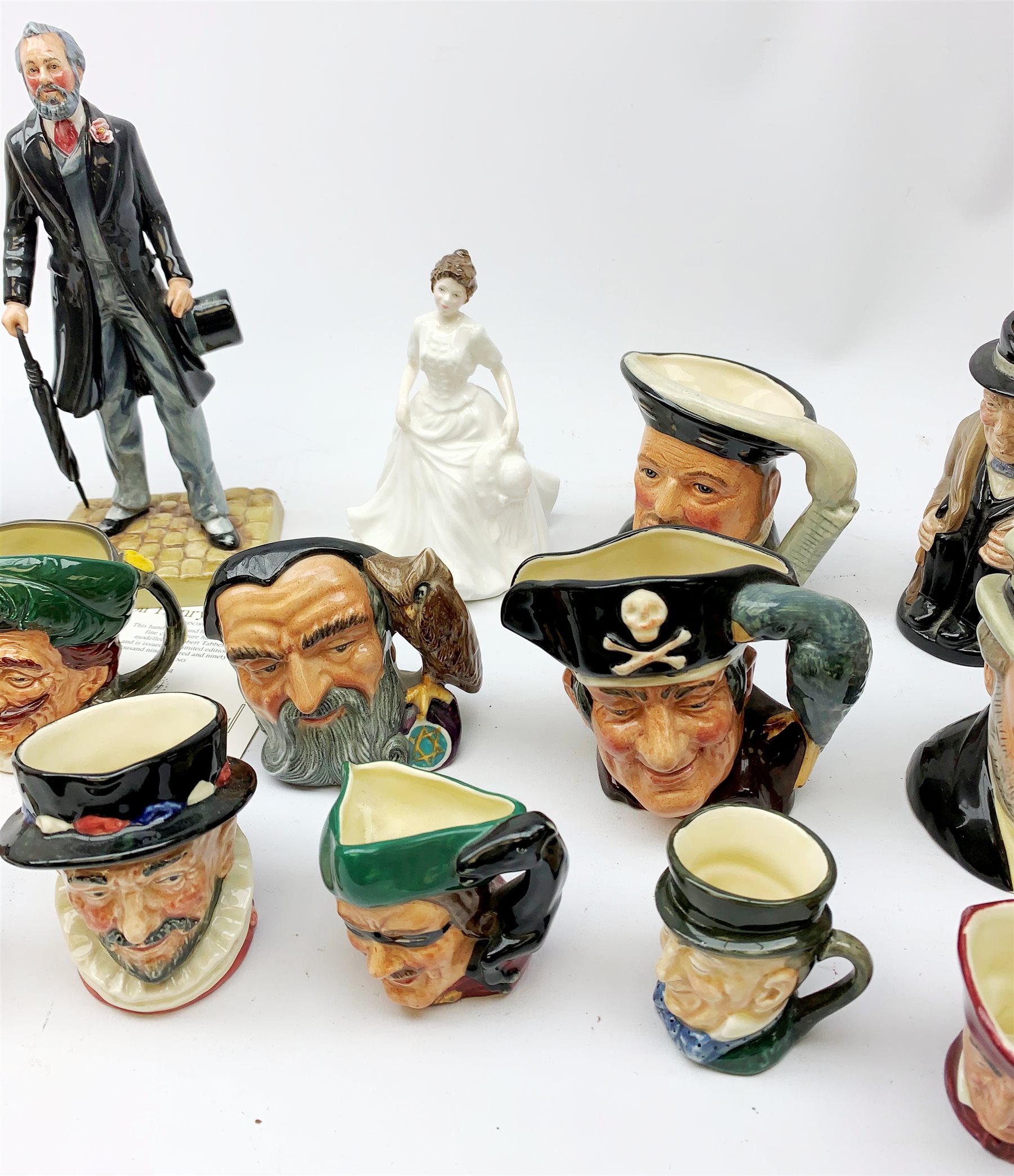  A limited edition Royal Doulton figurine, modelled as Sir Henry Doulton HN3891, no1154, with certificate, together with another Royal Doulton figurine Harmony HN4096, and a number of mostly Royal Doulton character jugs, including one modelled as Sir Henry Doulton D7057.   