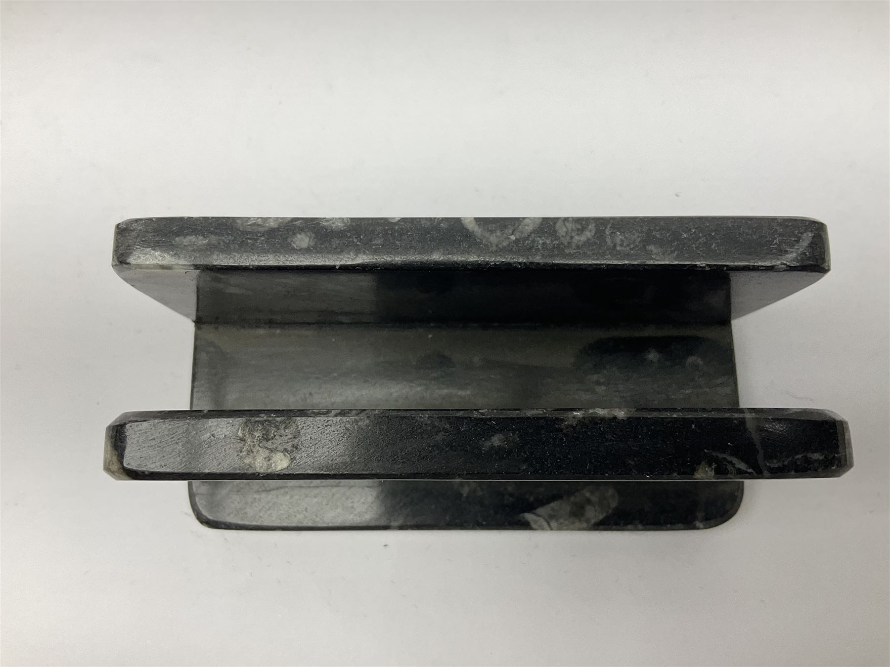 Three piece desk set, comprising letter rack, dish and box with raised Orthoceras to the lid, all with Orthoceras and Goniatite inclusions, age: Devonian period, location: Morocco