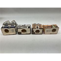 Twenty studio pottery figures of houses and cottages, comprising seventeen Mudlen End Studio Felsham Suffolk examples and two John Putman's Heritage Houses examples