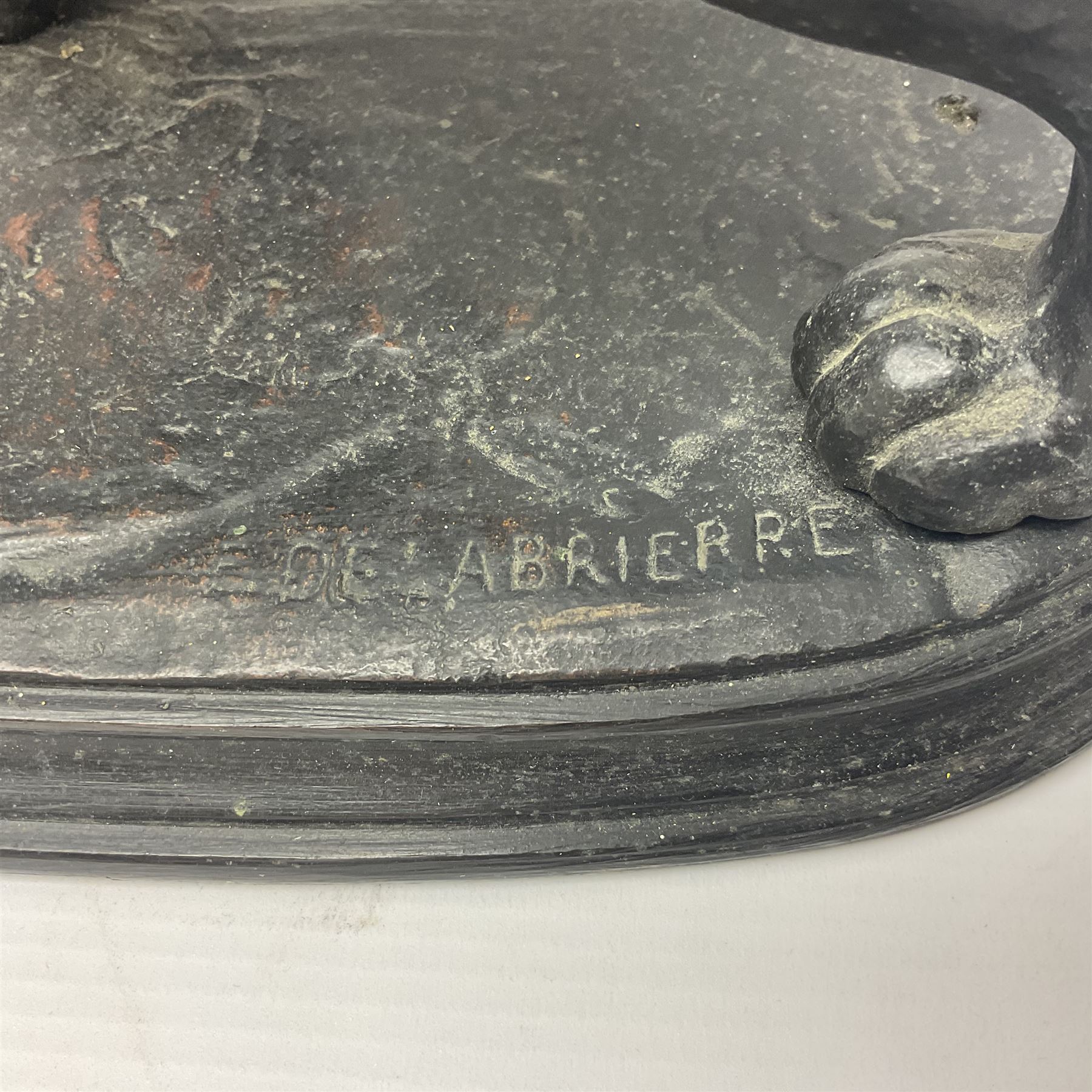 After Paul Edouard Delabrierre (French, 1829-1912), bronze, model of a lion, upon an oval base, signed E Delabrierre, overall H29.5cm, L46cm