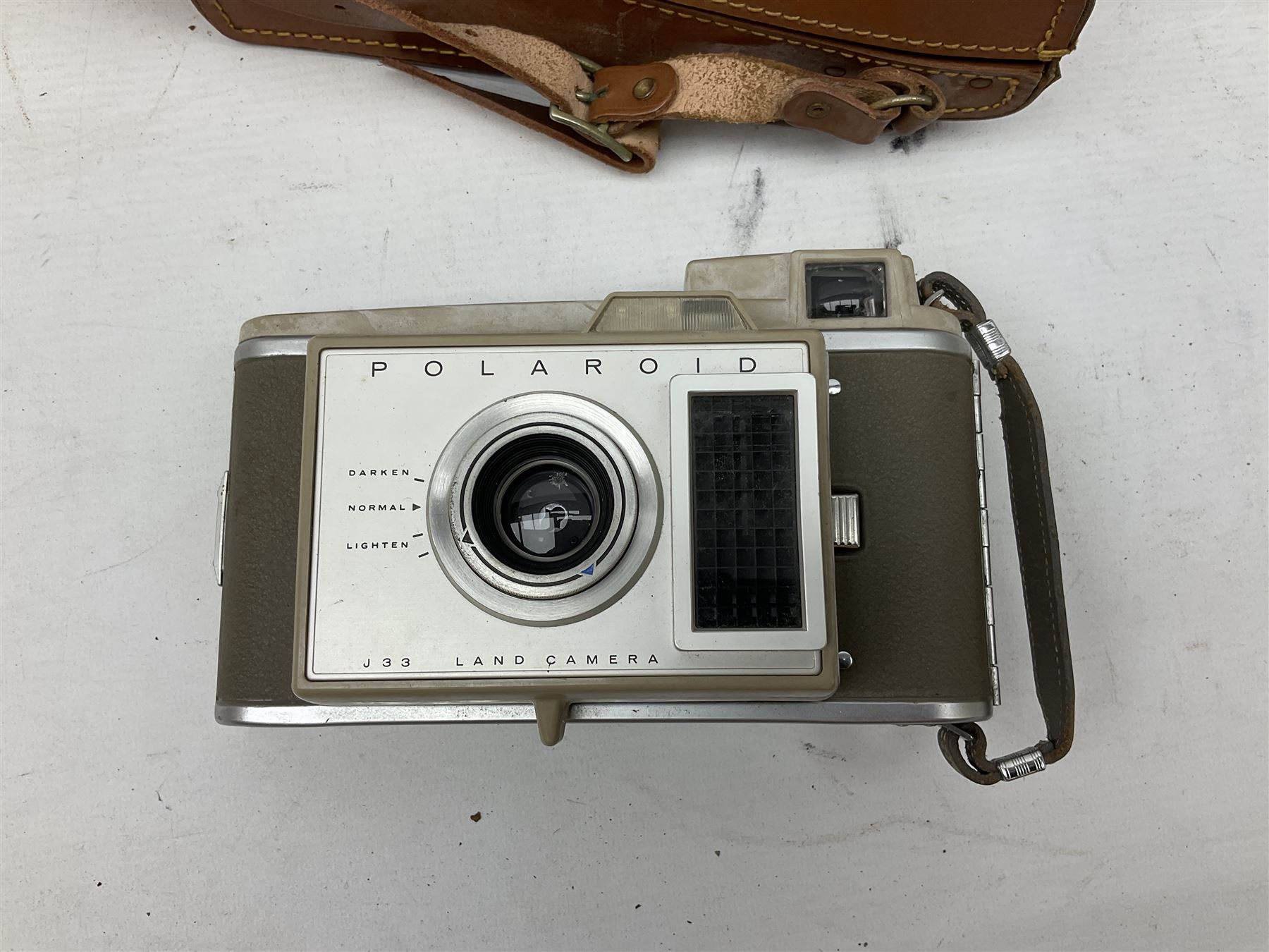 Cameras and camera equipment, including Kodak Retinette 1A, Polaroid J33 land camera, Kodak Colour snap 35, Agfa Isola I, three tripods etc,  