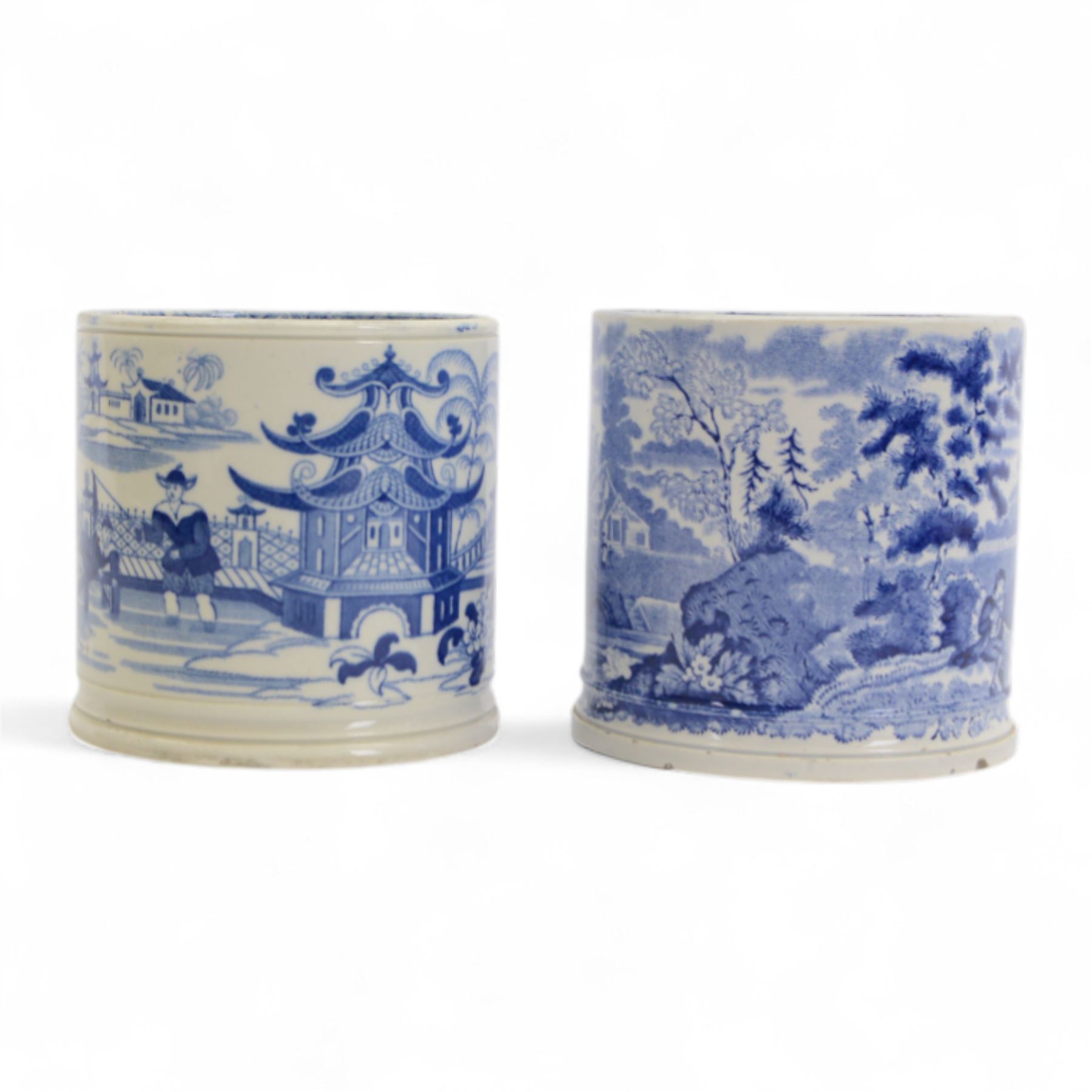 Two large 19th century blue and white transfer decorated pearlware mugs, the first example depicting a Chinese landscape with pagoda, and figures at rest and play, the second a pastoral landscape with shepherd and goats by waters edge, each approximately H12.5cm