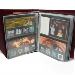 Queen Elizabeth II mint decimal stamps, mostly in presentation packs, face value of usable postage approximately 280 GBP, housed in three ring binder folders