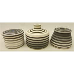  Jin Eui Kim, three lidded pots with tonal bands, comprising a reversible lidded pot and two lidded boxes (3)  