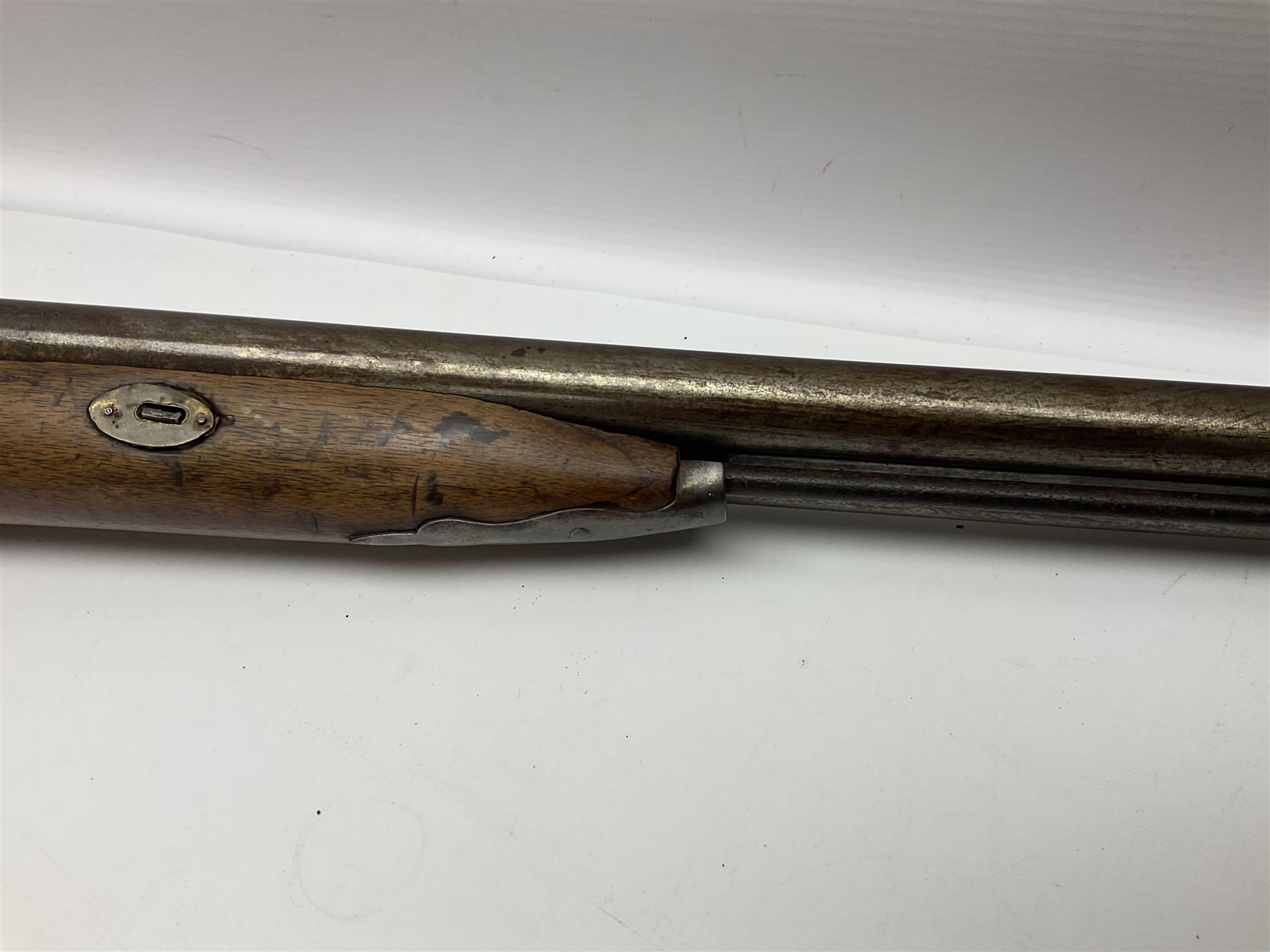 19th century Indian .577 Enfield muzzle loading rifle, proofed for 26-bore, the 98.5cm barrel with three barrel bands and later ram rod L140cm overall; 19th century Belgian side-by-side double barrel percussion shotgun, approximately 20-bore, with 74cm barrels and studded walnut stock, lock plate marked 'Liege 1868' and 'V. Gulikers-Maquinay' L117cm overall; and another side-by-side double barrel shotgun by Smythe with underlever opening (3)