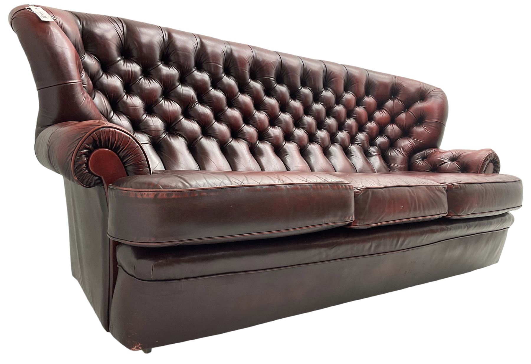 Wade - Georgian design three-seat sofa, high curved back over scrolled arms, upholstered in deep buttoned oxblood 'Pegasus' leather, on castors