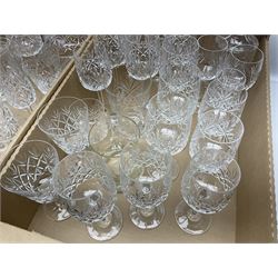 Collection of crystal wine glasses, champagne flutes, tumblers, etc, including Edinburgh Crystal, in two boxes 
