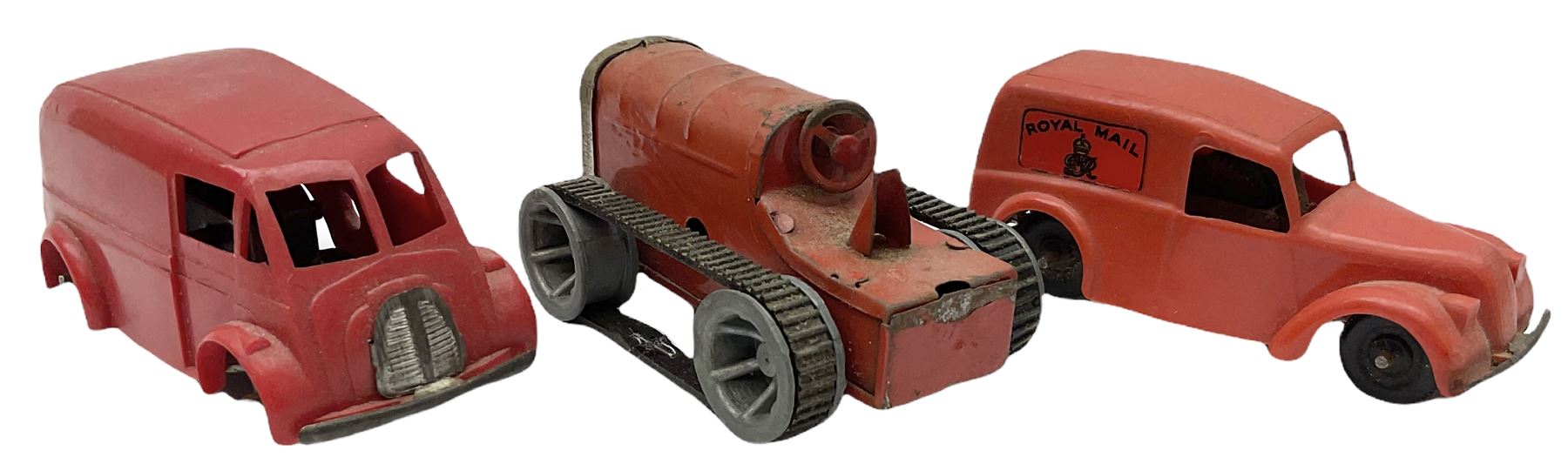 Eight Tri-ang Minic tin-plate/plastic clockwork vehicles comprising Tipper Lorry, Post Office Telephones Van, Caterpillar Tractor, Evening News Van, two Royal Mail Vans, American jeep and saloon car; all unboxed (8)