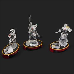 Swarovski crystal 'Masquerade' trilogy; 1999 Masquerade Pierrot, 2000 Columbine, 2001 Harlequin all with accompanying plaque, stand and original box