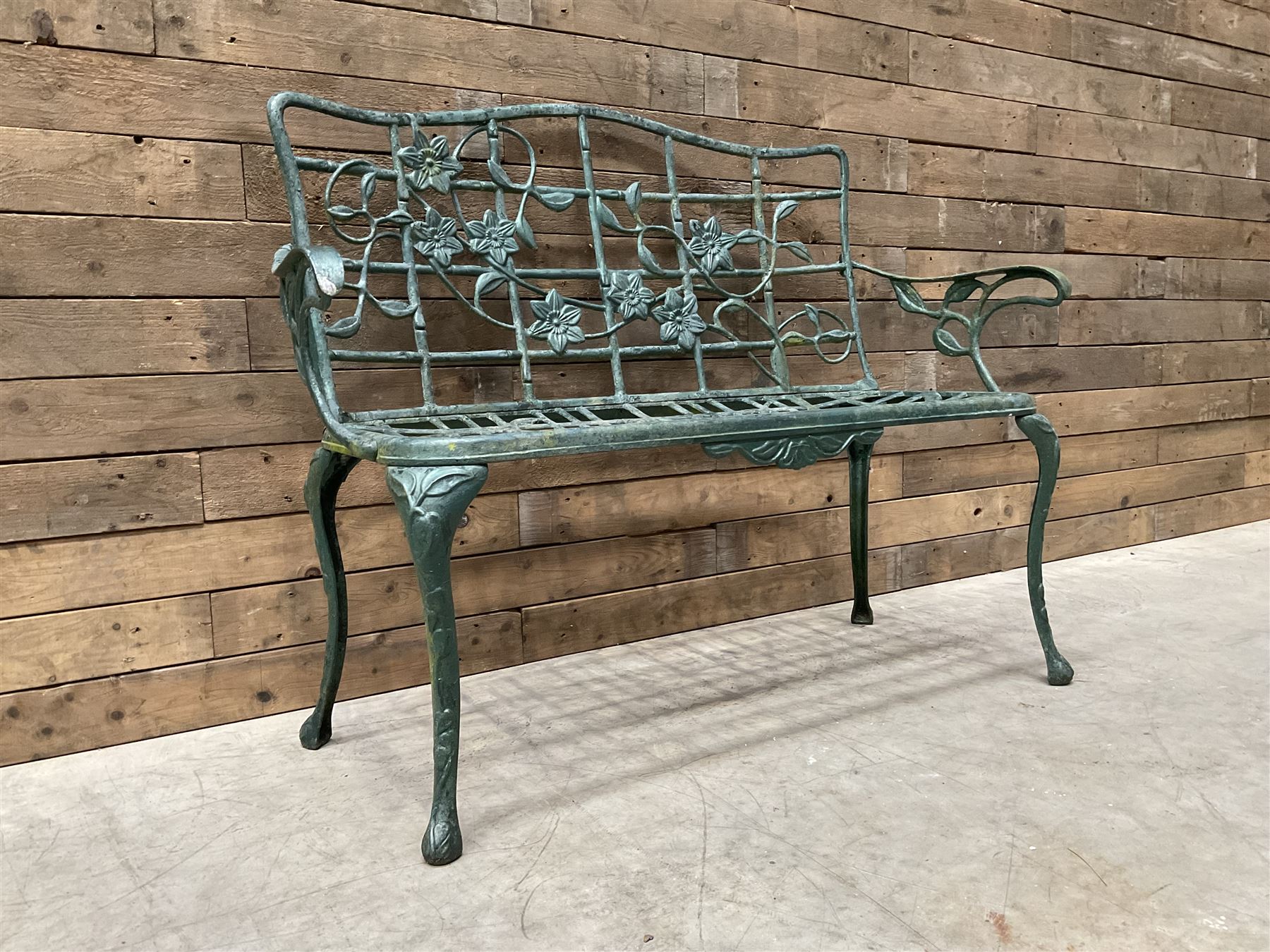 Cast aluminium garden dining set, comprising ornate circular table (D91cm, H68cm) a two seater bench, on cabriole supports (W118cm, H93cm, D55cm), and two matching armchairs (W55cm, H95cm, D54cm)