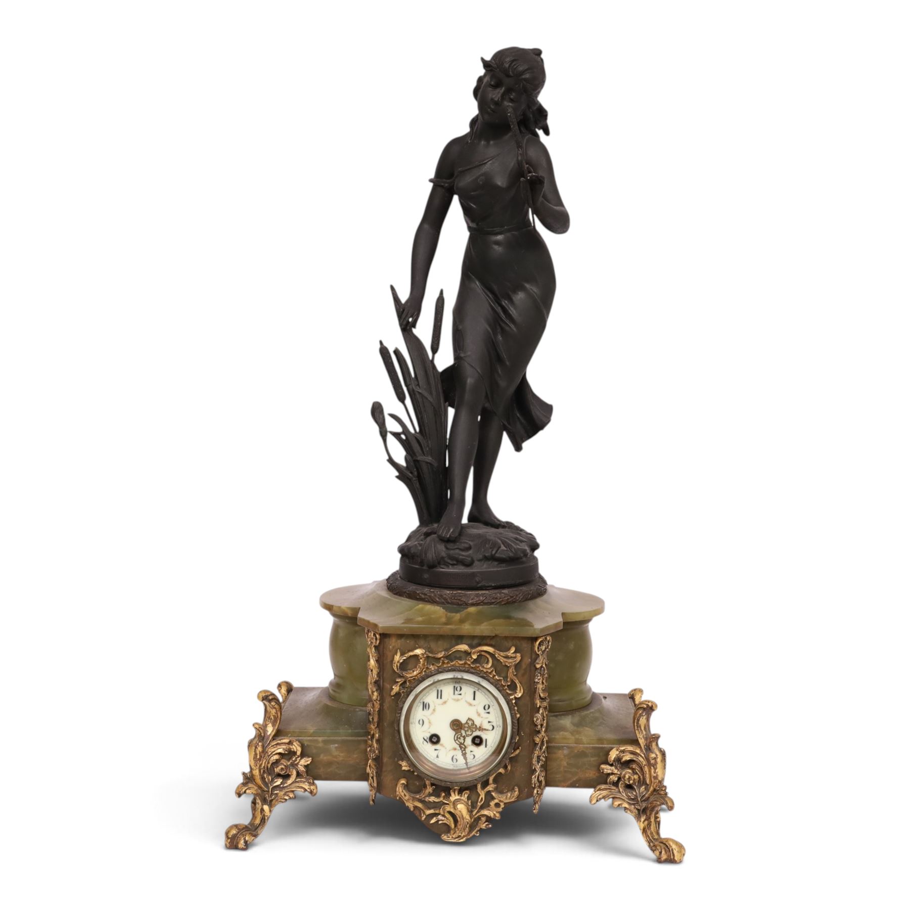 French green onyx clock, surmounted by a female figure amongst rushes, the enamel clock face with floral sprigs, H74cm 
