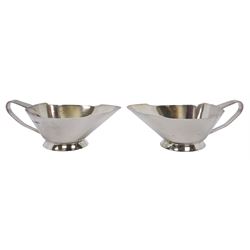 Pair of mid 20th century Art Deco style silver sauce boats, hallmarked Atkin Brothers, Sheffield 1941, H6cm L16.5cm, approximate weight 9.43 ozt (293.6 grams)