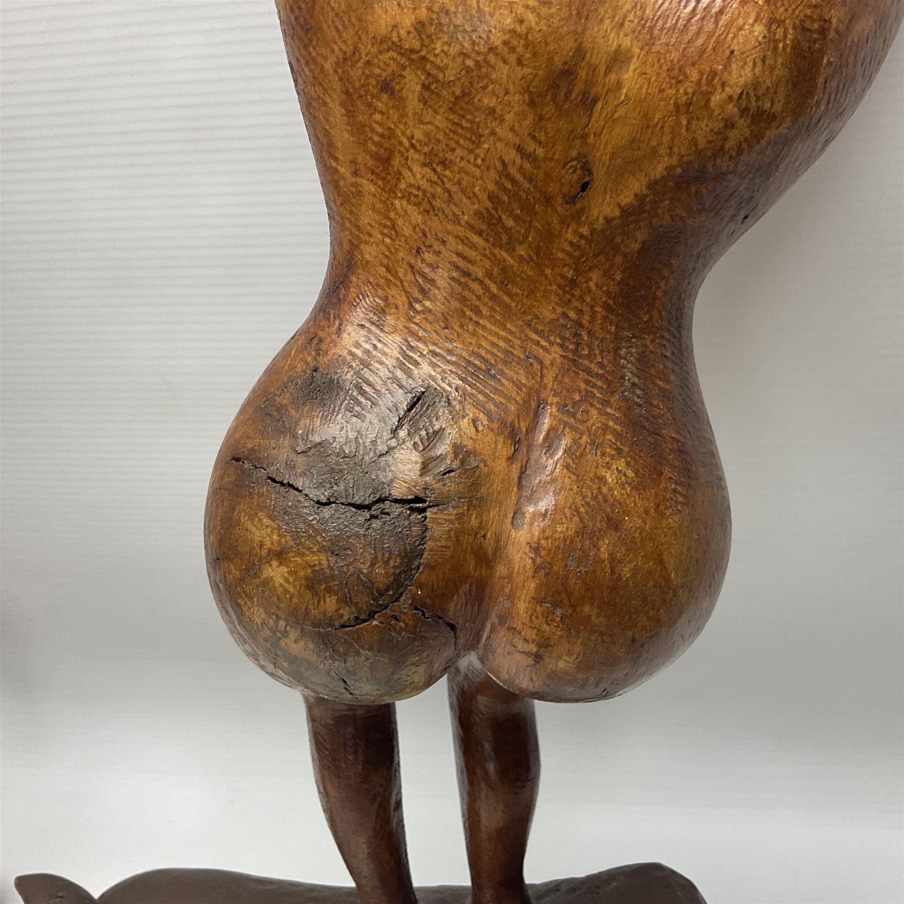 Helen Skelton (British 1933 – 2023): Three carved wooden abstract sculptures, each modelled as a a figure, tallest H52cm. Born into an RAF family in 1933 in Kent and travelled the world extensively during her childhood. After settling in Bridlington, Helen immersed herself in painting, textiles, and wood sculpture, often inspired by nature's beauty. Her talent was showcased in a one-woman show at Sewerby Hall and recognised with the sculpture prize at Ferens Art Gallery in 2000. Sadly, Helen’s daughter passed away from cancer in 2005. This loss inspired Helen to donate her sculptures to Marie Curie upon her passing in 2023.