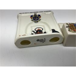 Ten WW1 crested china military models comprising seven field ambulances and three 'Home Fires Burning' fire-surrounds/range; various makers including Willow Art, Arcadian China, Grafton China, Savoy China, Carlton China etc; various crests including Devon, Aldershot, Portsmouth, West Ham, Coventry, Oxford, Hastings, Brighton etc (10)