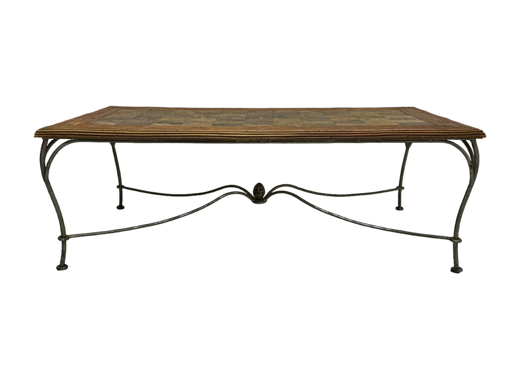 Mid-20th century coffee table, rectangular tiled wooden top framed by bamboo detailing, supported by wrought iron base with scrolled legs and central mosaic accent