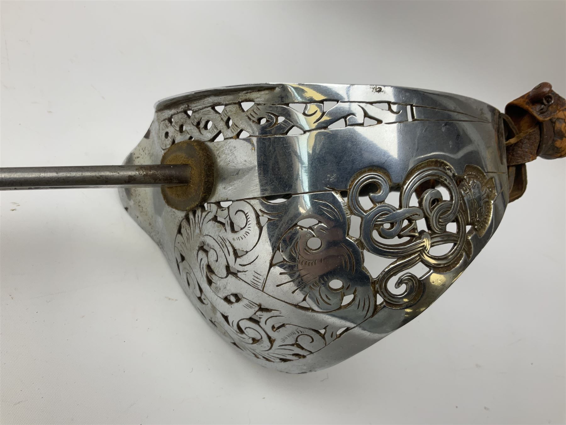 British George V 1897 Pattern Infantry Officers Sword, the 82.5cm fullered steel blade etched and polished with crowned royal arms, GRV cyphers and scrolling foliage, marked Army & Navy Co-operative Society 105 Victoria St London SW to the ricasso,  plated pierced basket hilt with wire bound fish skin grip and leather knot, No.15032; in leather covered scabbard