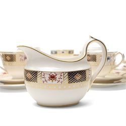 Royal Crown Derby 'Derby Border' pattern part tea service, comprising twelve teacups and saucers, twelve side plates, sandwich plate, milk jug and sugar bowl