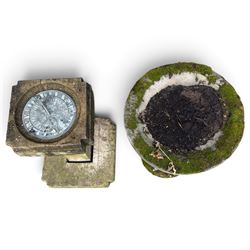 Weathered cast stone birdbath, circular bowl over a lobed baluster pedestal on circular base; weathered cast stone sundial of squared form with re-entrant corners and removable metal sundial with personified death motif