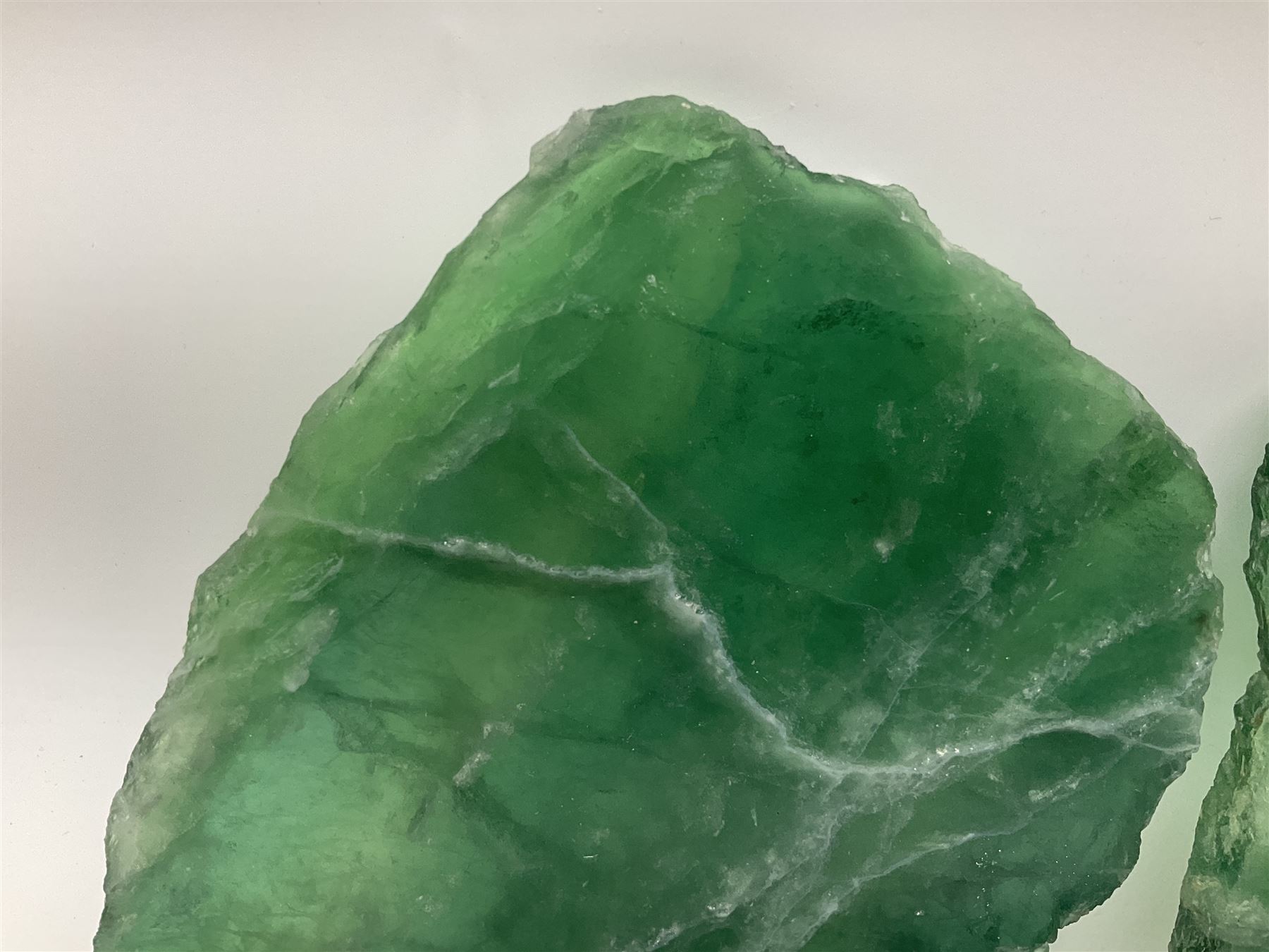 Pair of green fluorite slices, polished with rough edges, H16cm, L17cm  