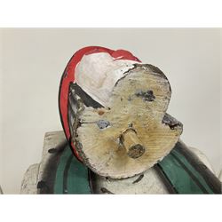 Folk art circus clown cabinet, the the two hinged doors with bow tie decoration opening to reveal fitted shelved interior, the body painted with polka dots and spades, H121cm