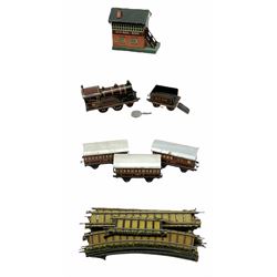 Bing '00' gauge - Table Top train set with clockwork 2-4-0 LMS locomotive and tender, three passenger coaches, signal box and thirteen sections of track; unboxed.