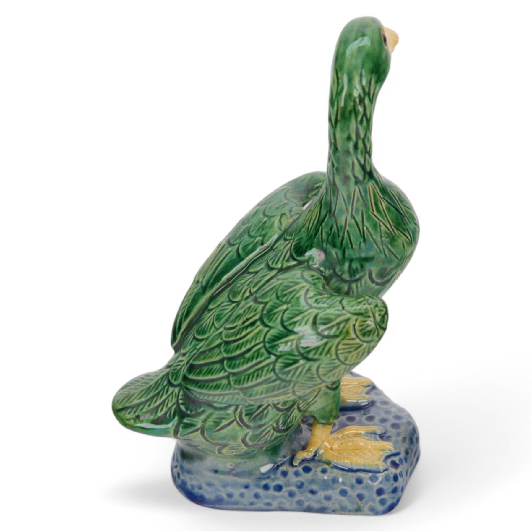 Pair of 20th century Chinese standing ducks, standing on a mottled base, H20cm