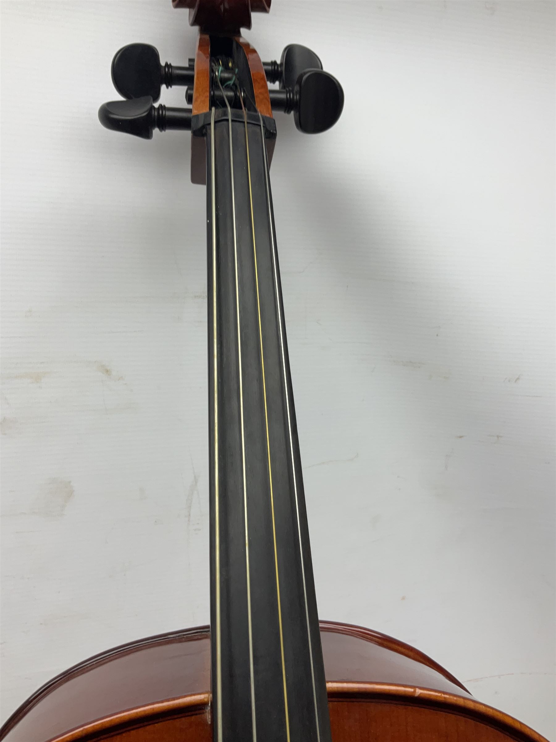 Modern Hungarian half-size cello with 69cm two-piece maple back and ribs and spruce top L114cm overall; and Stentor half size cello bearing label 'The Stentor Student II'; each in soft carrying case (2)