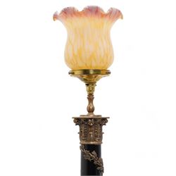 Victorian copper and brass fire hose branch, converted to a table lamp, on circular wooden plinth, H63cm together with a 20th century brass and ebonised corinthian column table lamp, with vine entwined stem and leaf cast square base, both with mottled glass shades (2)