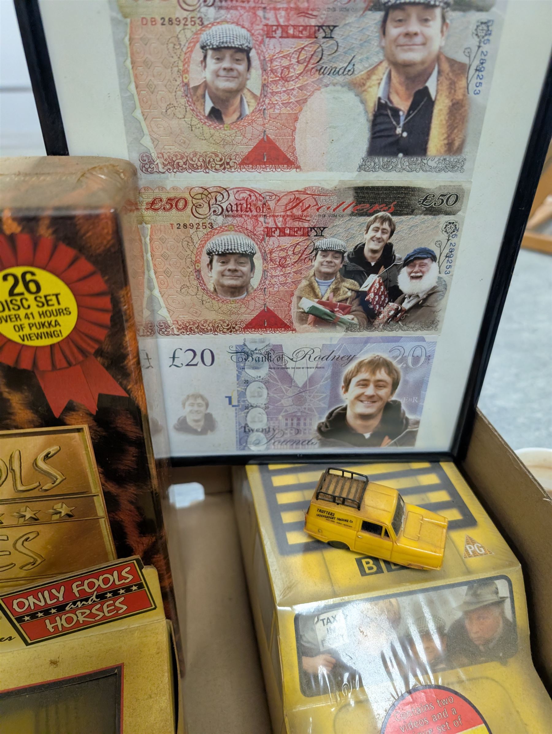 Collection of Only Fools and Horses memorabilia, including Westminster Mint limited edition fifty pence coin set, DVD box set, Corgi Reliant Regal, playing cards, framed bank notes, Griffin Cartoon of the bar scene, etc, together with a Vicar of Dibley DVD box set