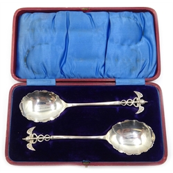  Pair of silver spoons with caduceus terminals and scalloped edging around bowl, James Deakin & Sons, Sheffield 1903, approx 3.8oz, cased  