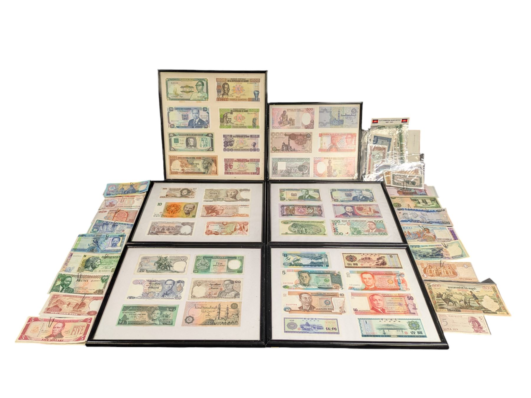World banknotes, including Central Bank of Nigeria, Indonesia, Central Bank of Egypt, Republic of Liberia, Central Bank of Kenya, Central Bank of the Gambia, Singapore, Belgium etc, loose and in five framed displays