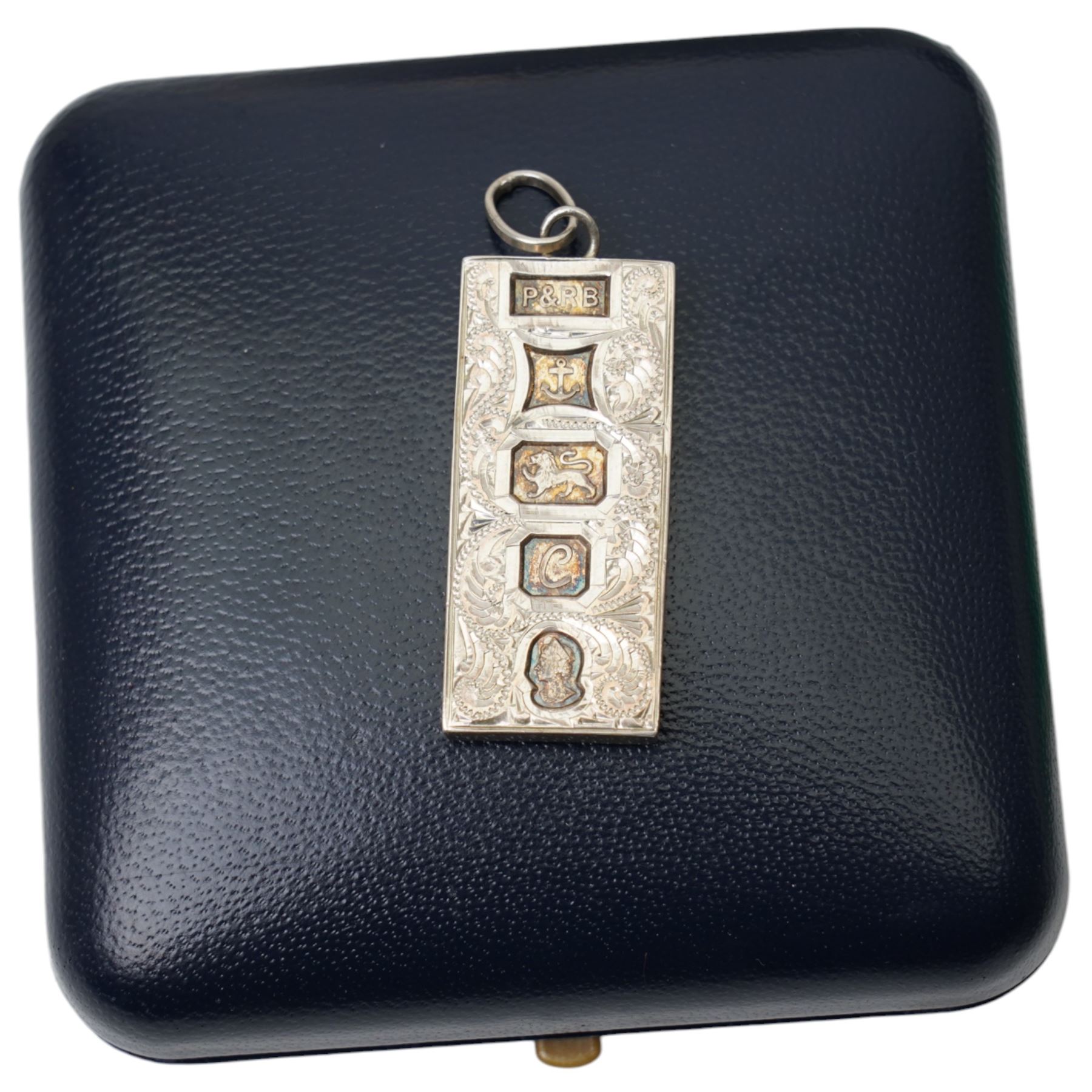 Collection of commemorative coins,. silver ingot pendant and chain and £5 coin