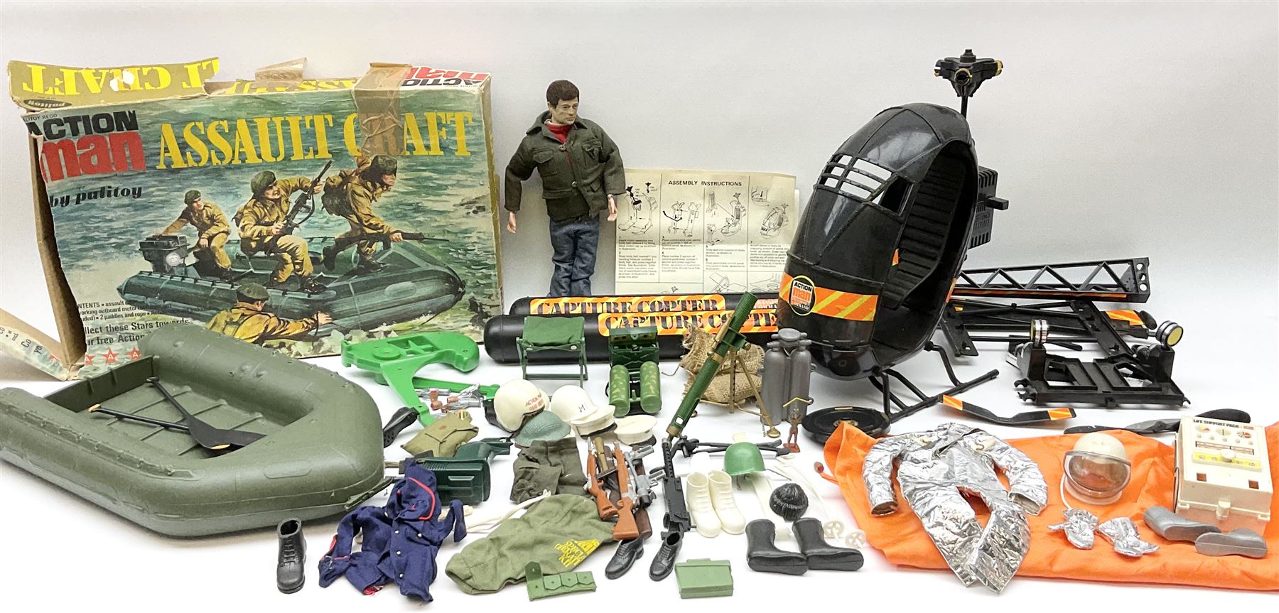 Action Man - one figure, boxed Assault Craft, dismantelled  Capture Copter, two bags of equipment and accessories etc