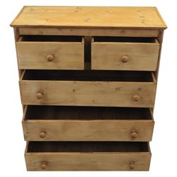 Victorian polished pine chest, straight front with panelled sides, fitted with two short and three long drawers, turned wooden handles