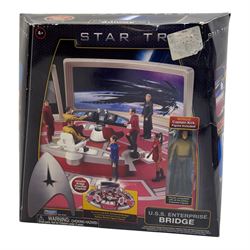 Three Art Asylum Star Trek action figures, comprising The Next Generation Admiral William Riker, Enterprise Broken Bow Lieutenant Malcolm Reed and Enterprise Broken Bow Captain Jonathan Archer, together with three Playmates Toys playsets and figures, including U.S.S Enterprise Bridge playset, Cadet Uhura action figure and Pike action figure, all boxed or carded