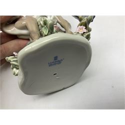 Two Lladro deer figures, comprising A Fawn and Friend no 5674 and Hi There no 5672, both with original boxes, largest example H14.5cm