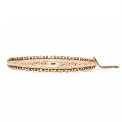 Edwardian 9ct rose gold bangle, with engraved decoration and wirework and bead work surround, Chester 1904