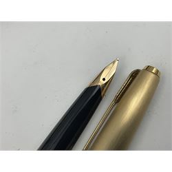 Three rolled gold Parker fountain pens, comprising an example with a gold nib marked 14K 585 and barrel with a shell stamp, a Parker 61 fountain pen with inset gold arrow to the nib, and another similar, all with striated decoration and arrow clips to the caps, L13cm, one with box