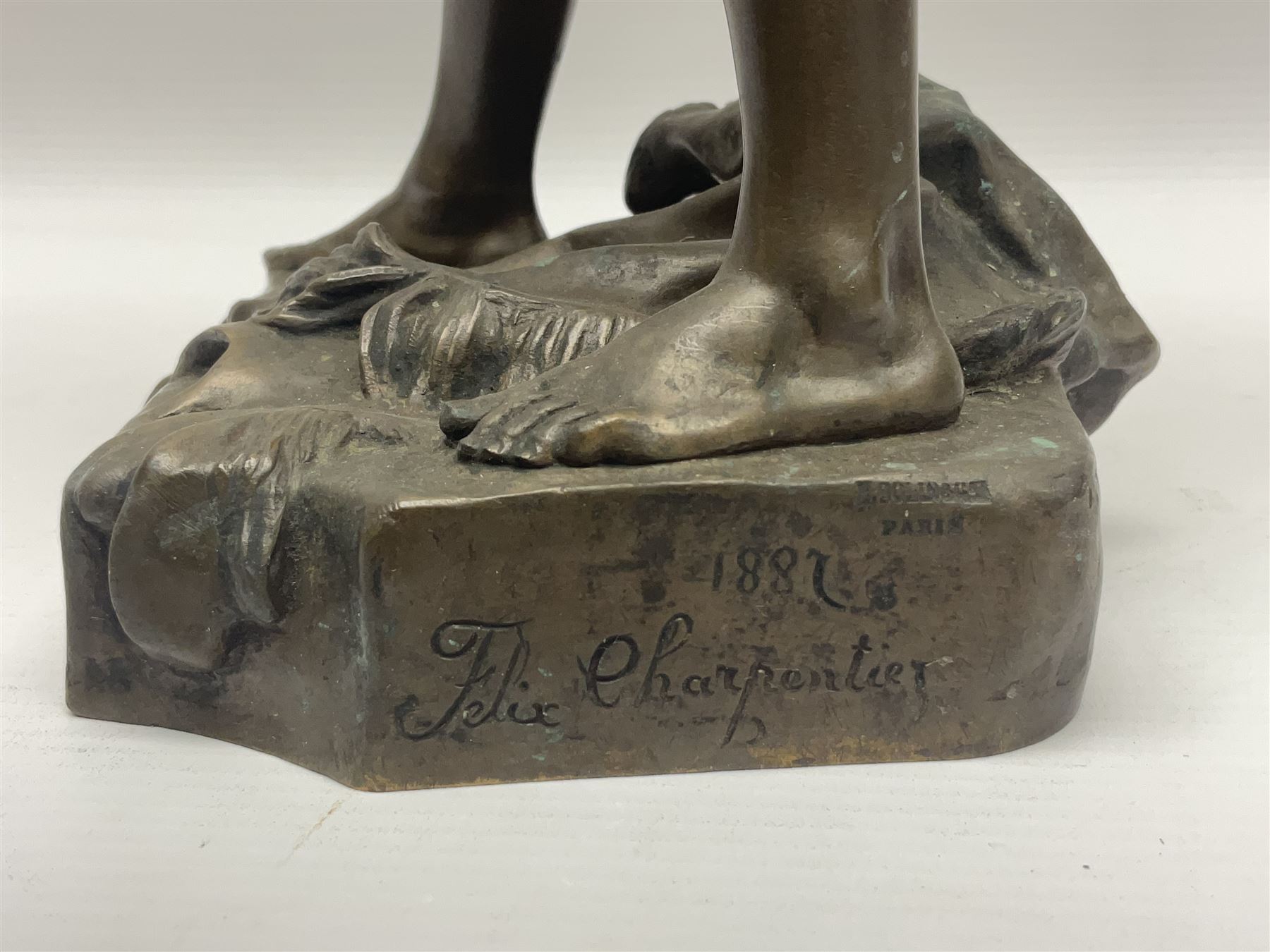 After Felix Carpentier, Improvisateur; bronzed figure of a man playing the flute, marked Felix Charpentier, H35