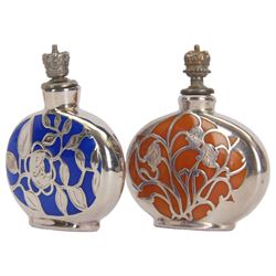 German silver and enamel perfume bottles, each with silver overlay floral decoration, and a crown top stopper, H6cm