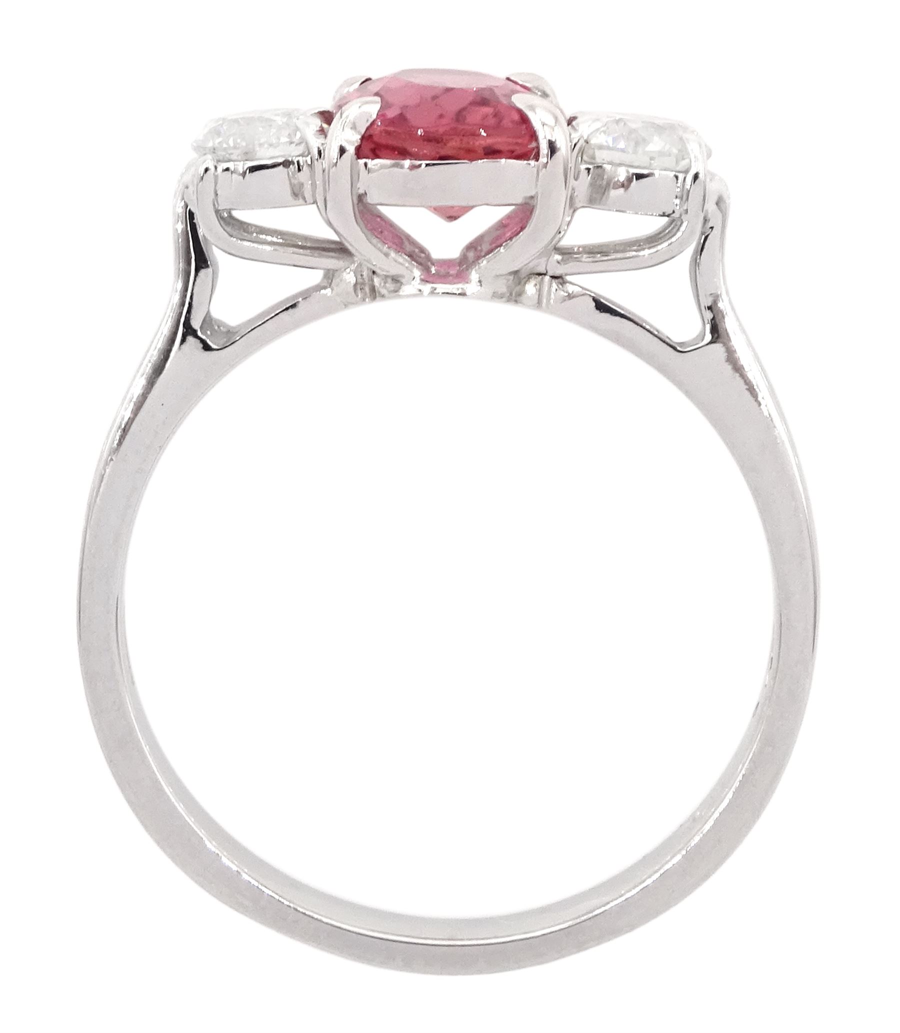 18ct white gold three stone oval cut pink tourmaline and round brilliant cut diamond ring, hallmarked, tourmaline approx 2.60 carat, total diamond weight approx 0.40 carat
