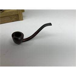 Pipes and two tiered wooden rack together with eleven pipers, including briar pipe carved as a wolf, Sea Dog straight pipe, John Brumfit pipe, meerschaum pipe ect, pipe rack H29.5cm