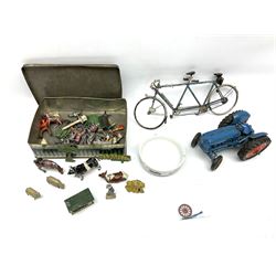Chad Valley clockwork Fordson Major Tractor, a group of play worn Britains and other lead and metal farm animals, figures and accessories including a kennel, haystacks, dovecote, cows, sheep etc, together with a diecast model of a Tandem Bike L31cm