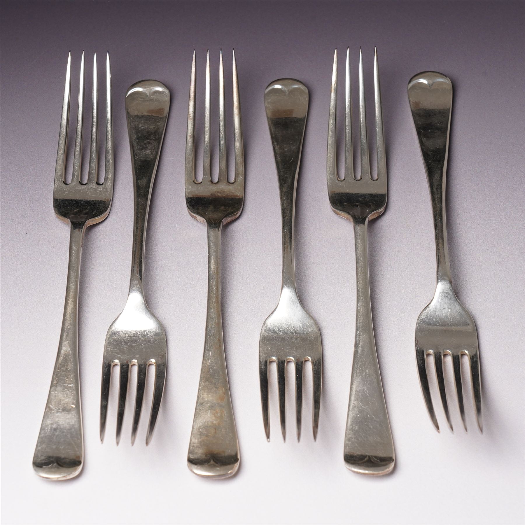 Set of six Edwardian silver Old English pattern table forks Sheffield 1909 Maker Fenton Russell & Co Ltd
