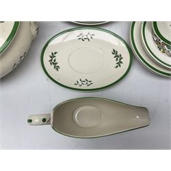 Collection of Spode Christmas Tree pattern part dinner service, comprising three covered tureens, eight dinner plates, eight side plates, eight dessert plates, sauce boat and saucer and serving platter (30)