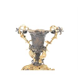 After Henry Dasson (1825-1896): large French gilt bronze urn, the body of typical form and cast with C scrolls, with twin curved gilt foliate handles detailed with birds, upon a scrolling foot, and naturalistically cast base, impressed HENRY DASSON to foot, H50.5cm W48cm