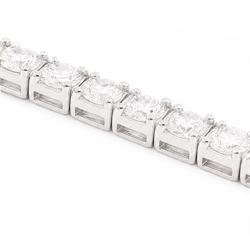 18ct white gold diamond bracelet, four claw set with seventy-three round brilliant cut diamonds, stamped, total diamond weight approx 2.50 carat