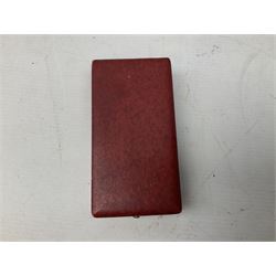 Five continental medals - WW1 Belgian Cross of Fire; WW1 French Croix De Guerre; French Croix De Combattant; French Republic Workers silver merit awarded to L. Mounet 1950; and boxed French Palmes Universitaires Officier d'Academie silver and enamel wreath (5)